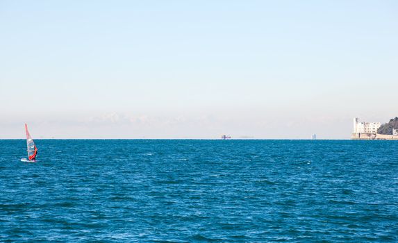 View of a Windsurfer in the Trieste sea