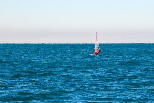 View of a Windsurfer in the Trieste sea