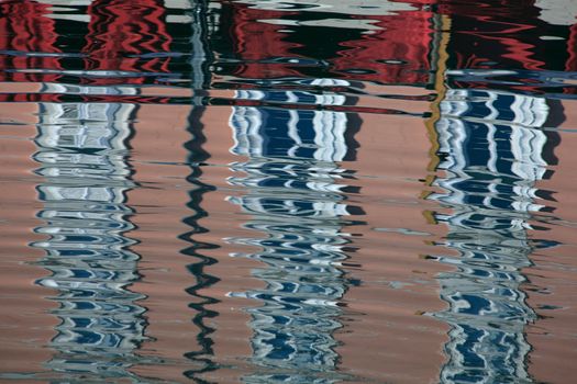 Colorful buildings reflected on the sea, Canal Grande in trieste