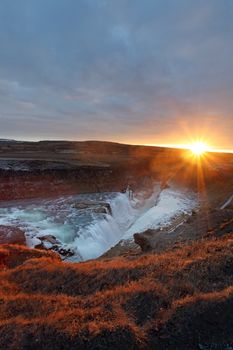 Gullfoss waterfall at sunset in Iceland during winter
