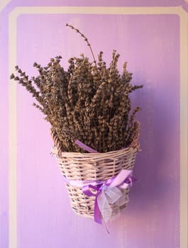 Photo of Wicker basket with lavender flowers