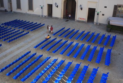 View of Empty blue chairs for outdoor cinema