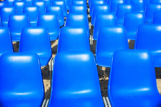View of Empty blue chairs for outdoor cinema