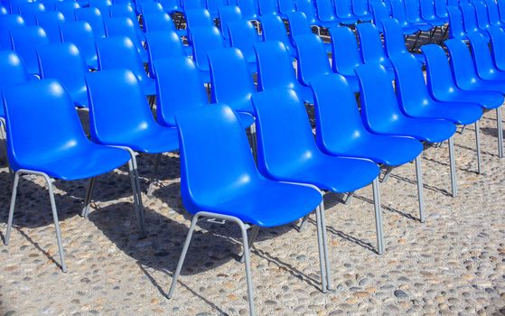 View of Empty blue chairs for outdoor cinema