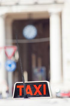 Detail of a white taxi in Milan