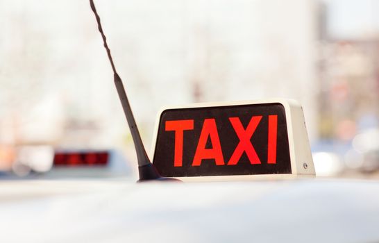 Detail of a white taxi in Milan