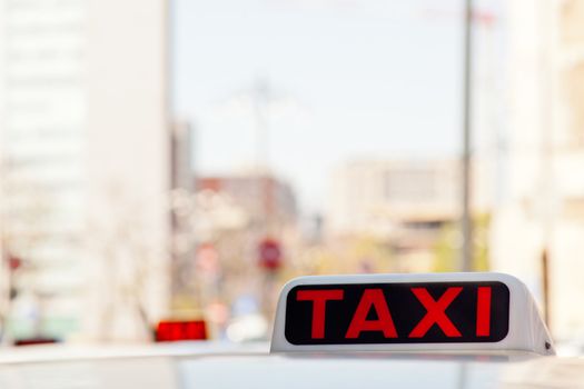 Detail of a white taxi in Milan