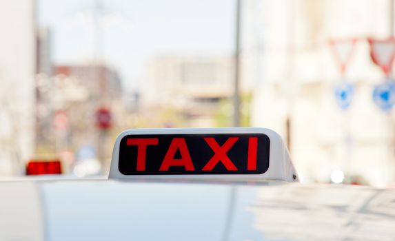Detail of a white taxi in Milan
