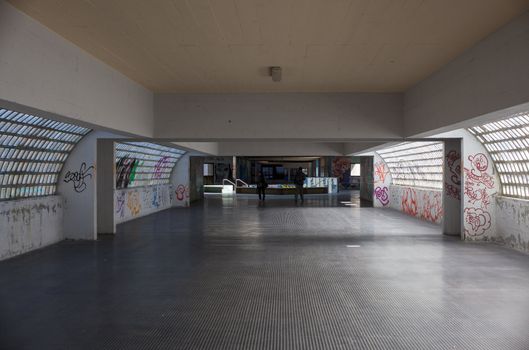 View of tunnel with graffiti in Trieste