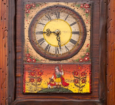 Close up of an old wooden Clock