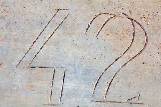 Photo of Numbers forty-two etched in stone