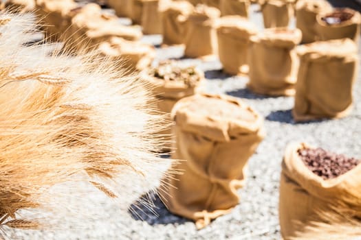 Wheat sacks during a sunny day in a warm  summer season