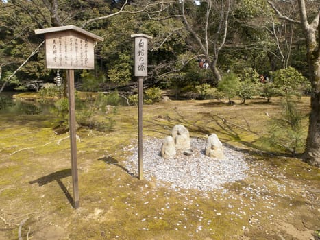 Stone statuary in Kinkakuji temple (The golden pavilion temple) in Kyoto, Japan