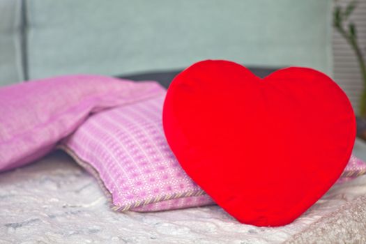 Photo of Pillow heart on the bed