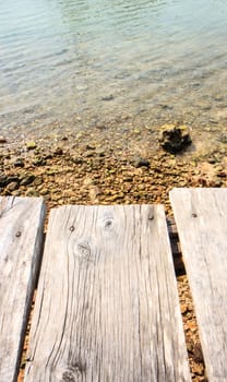 close up wood Bridge on the sea