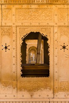 Floral classical Rajasthan ornament and arches on ruins of Bada Bagh, Jaisalmer, India