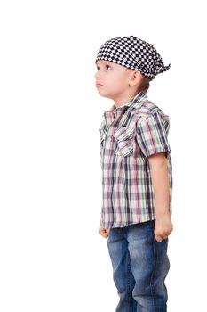 Portrait of a angry capricious preschool kid in bandanna and shirt, isolated on white 