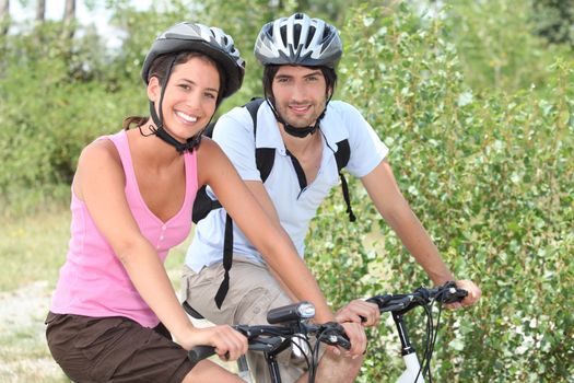 Couple enjoying bike ride