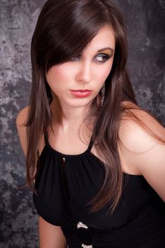 Young brunette woman beauty portrait. Beauty studio shot