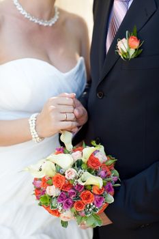 bouquet and wedding ring of bride and groom