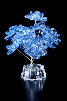 Beautiful blue flowers of decorative glass.