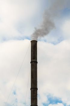 problem of environmental conditions. pollution smoke from manufacturing chimney on a sky background