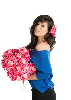 woman with a rose in her hair and a bouquet of roses