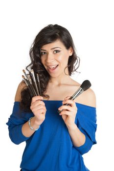 beautiful brunette holding a makeup brush