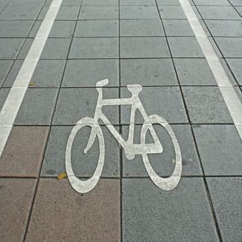 Bike lane symbol on road