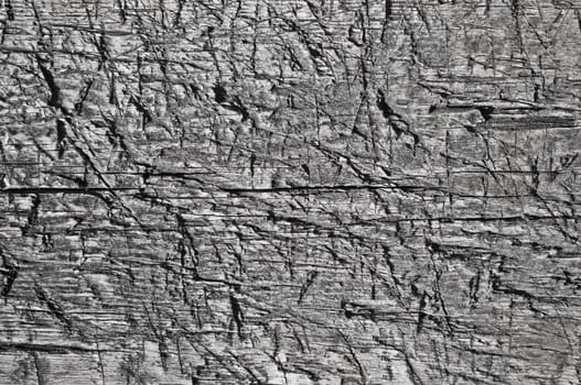 Fragment of old weathered rugged boards texture