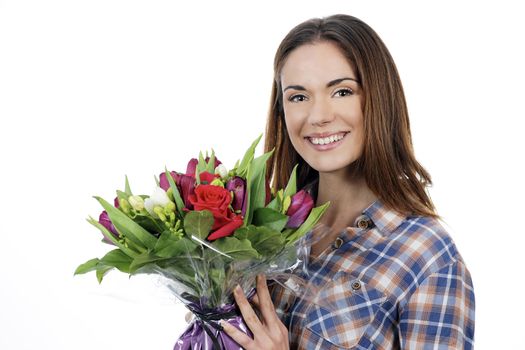 Portrait of happy smiling beautiful young woman with bouquet