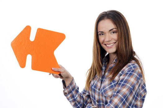 woman holding orange arrow isolated on white background