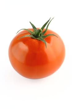 fresh tomatoes with green leaves on white background , with a clipping path