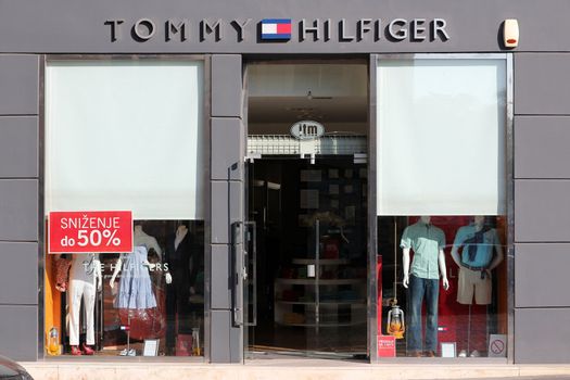 BELGRADE, SERBIA - AUGUST 15: Tommy Hilfiger store on August 15, 2012 in Belgrade, Serbia. TH is a successful fashion company founded in 1982. It had net income of US$ 1.5 billion (2009).
