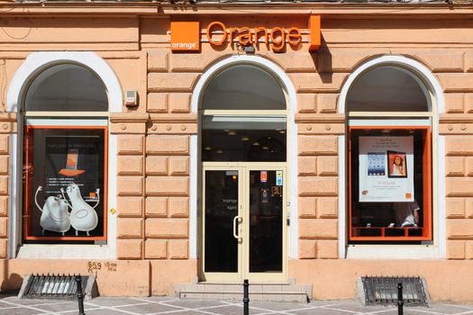 BRASOV, ROMANIA - AUGUST 21: Orange GSM branch on August 21, 2012 in Brasov, Romania. Orange Romania is the largest GSM operator in Romania with 10.274 millions subscribers (2011).