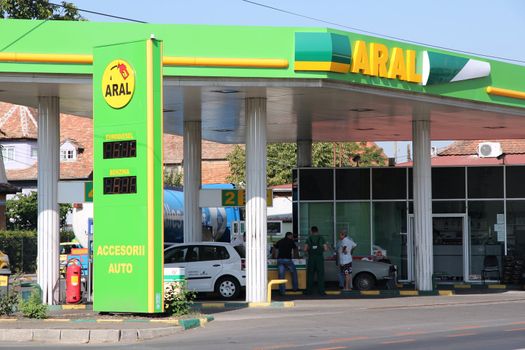 SIBIU, ROMANIA - AUGUST 24: Drivers fill up their tanks on Aral station on August 24, 2012 in Sibiu, Romania. Aral runs 2,400 stations internationally and has 600 million customers annually.