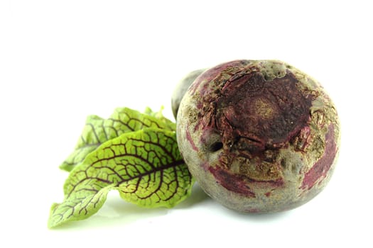 Beetroot with leaves on white background.
