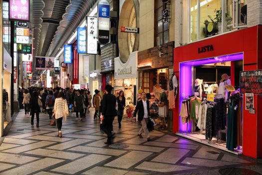 OSAKA, JAPAN - APRIL 24: Shoppers walk along Shinsaibashi arcade on April 24, 2012 in Osaka, Japan. According to Tripadvisor, it is currently among top 10 worth visiting in Osaka.