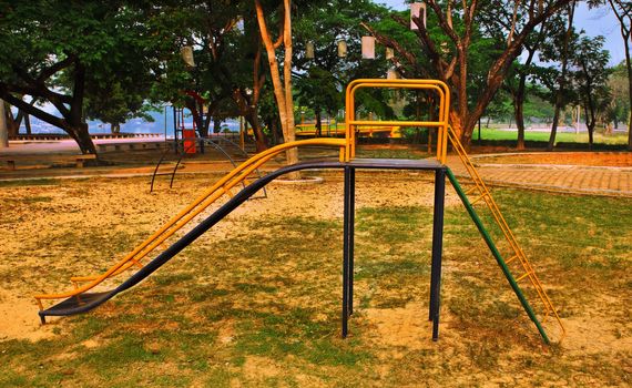 Steel swing with ropes isolated on park