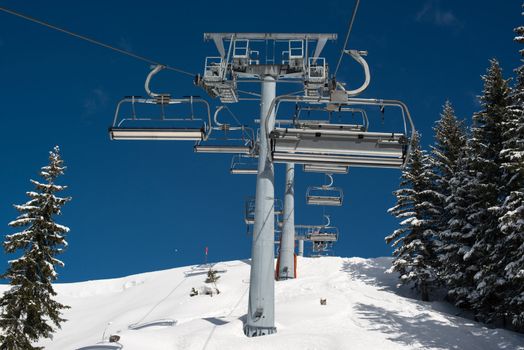 Skilift in a skiing resort in the Alpes in a valley of Montafon