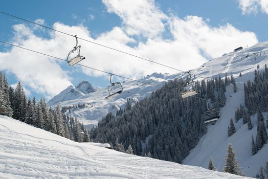 Skilift in a skiing resort in the Alpes in a valley of Montafon