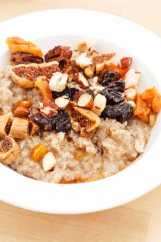 oatmeal with raisins, nuts and maple syrup