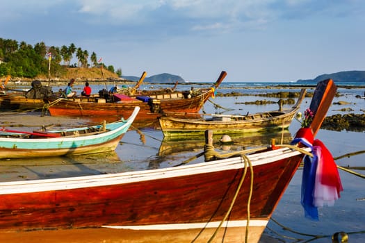 Fishing boats on the sea shore in Phuket, Thailand