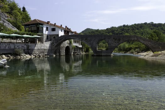 Famous twin arch bridge at Rijeka Crnojevica Montenegro