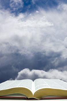 Open bible with the "In the Beginning Sky"