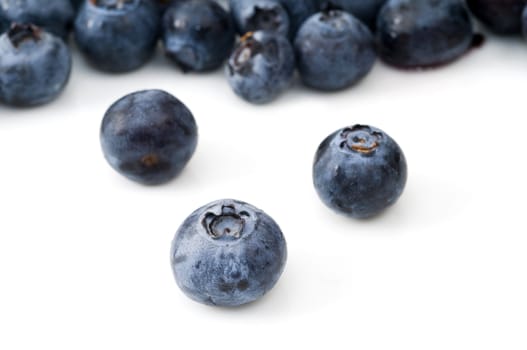 Selective focus on the foreground blueberry