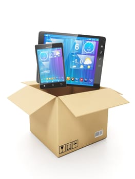 Buying a mobile of electronics. Mobile phone and tablet computer out of a cardboard box
