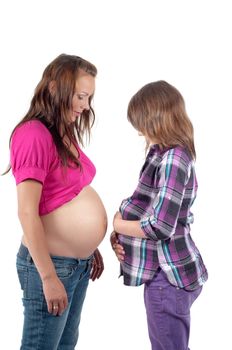 Beautiful pregnant woman with daughter in studio isolated on white