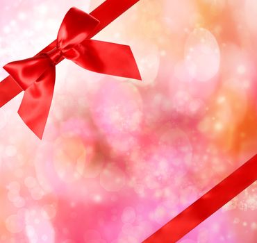 Red Bow and Ribbon with Magenta Bokeh Lights Background 