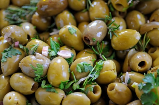 Salad of domestic olives prepared on traditional way with parsley, rosemary and garlic.